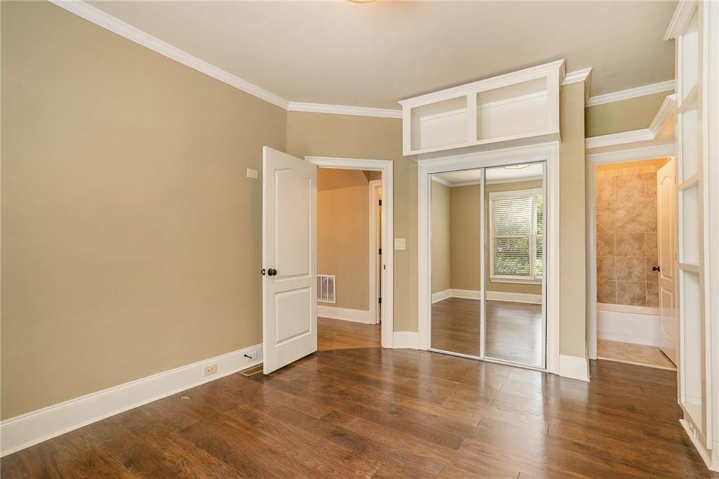 2317 Crimson King Drive Braselton, GA 30517 - Photo 51 of 66 wooden floor in an empty room