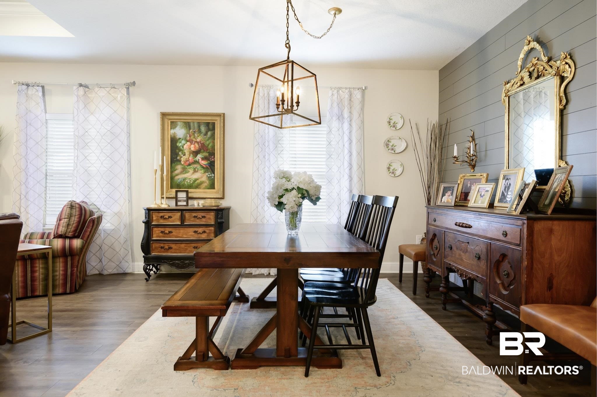 31751 Kestrel Loop Daphne, AL 36527 - Photo 5 of 21 Dining area featuring dark wood finished floors and suspended lighting