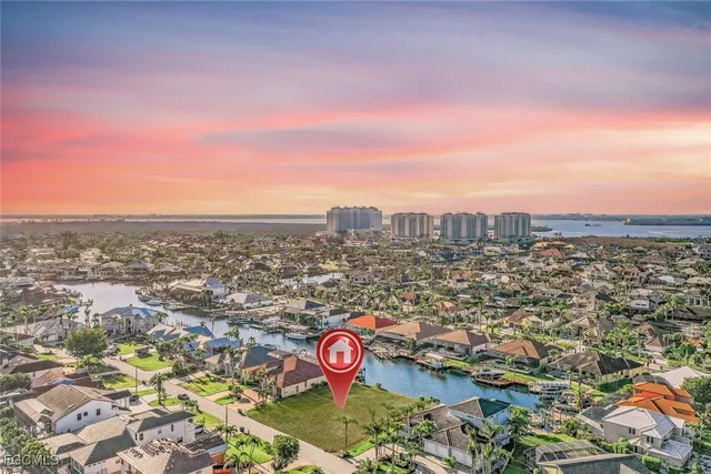 an aerial view of a city with lots of residential buildings