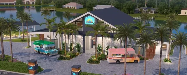 a backyard of a house with barbeque oven table and chairs