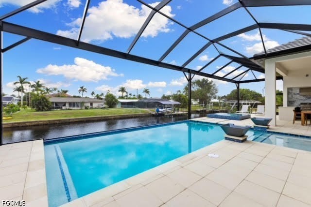 1524 Southwest 57th Street Cape Coral, FL 33914 - Photo 18 of 45 a view of swimming pool with a patio