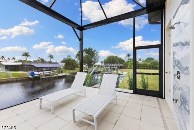 1524 Southwest 57th Street Cape Coral, FL 33914 - Photo 20 of 45 a view of swimming pool with outdoor seating and lake