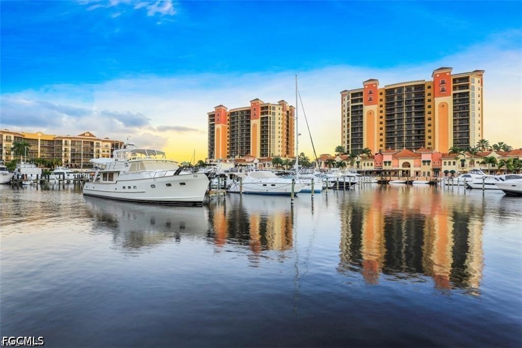 1524 Southwest 57th Street Cape Coral, FL 33914 - Photo 35 of 45 a view of a lake with tall building