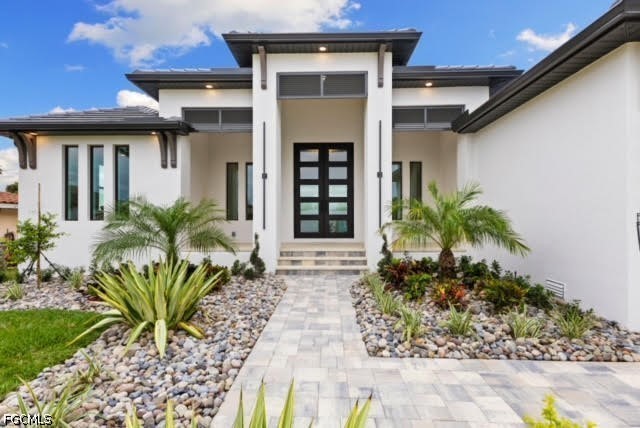 1524 Southwest 57th Street Cape Coral, FL 33914 - Photo 4 of 45 a view of a entryway of the house