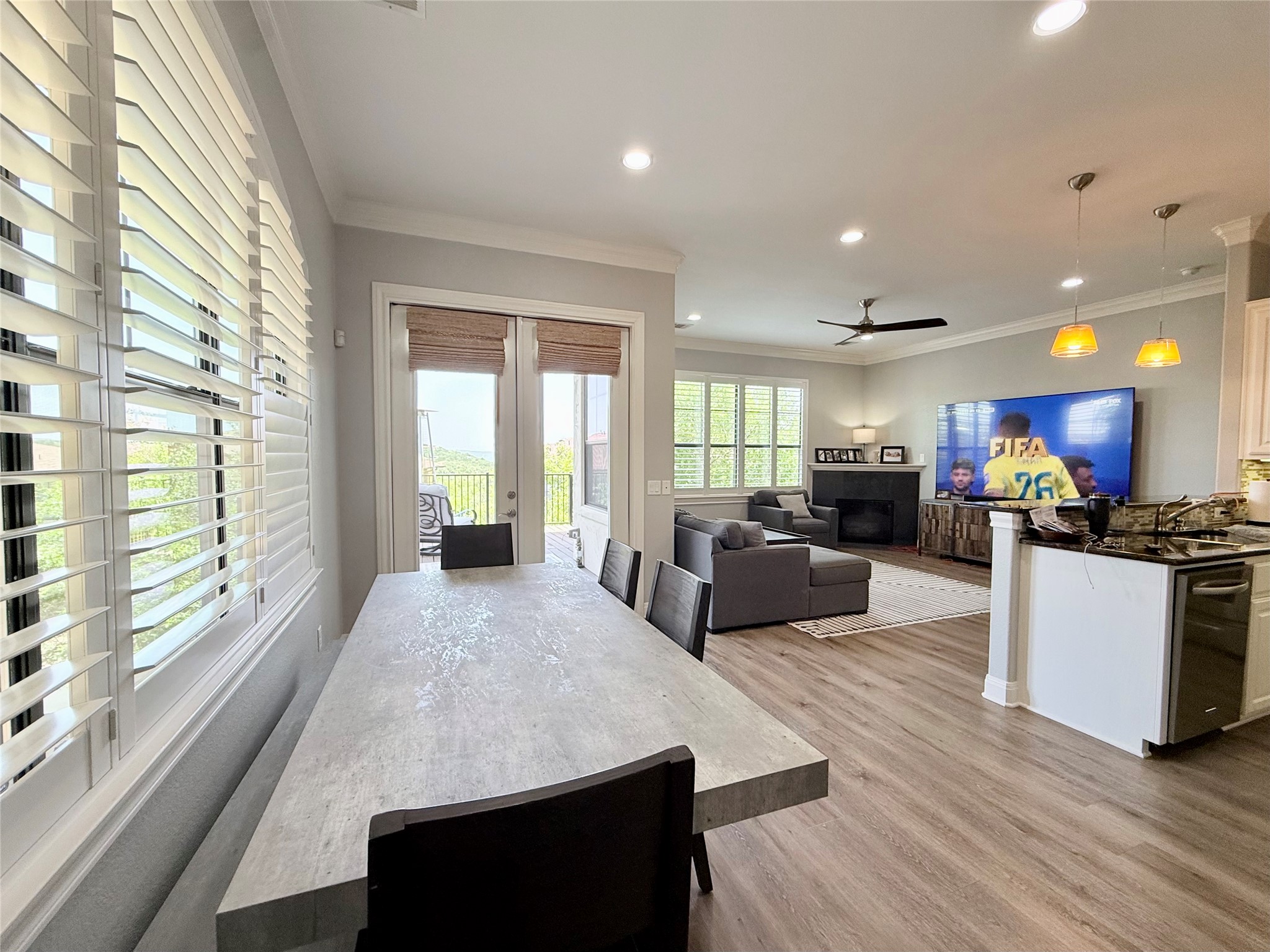 4000 Ranch Road 620 North, Unit 7 Austin, TX 78734 - Photo 1 of 1 An open floorplan seamlessly connects the dining area, living room, and kitchen, creating an ideal space for entertaining.