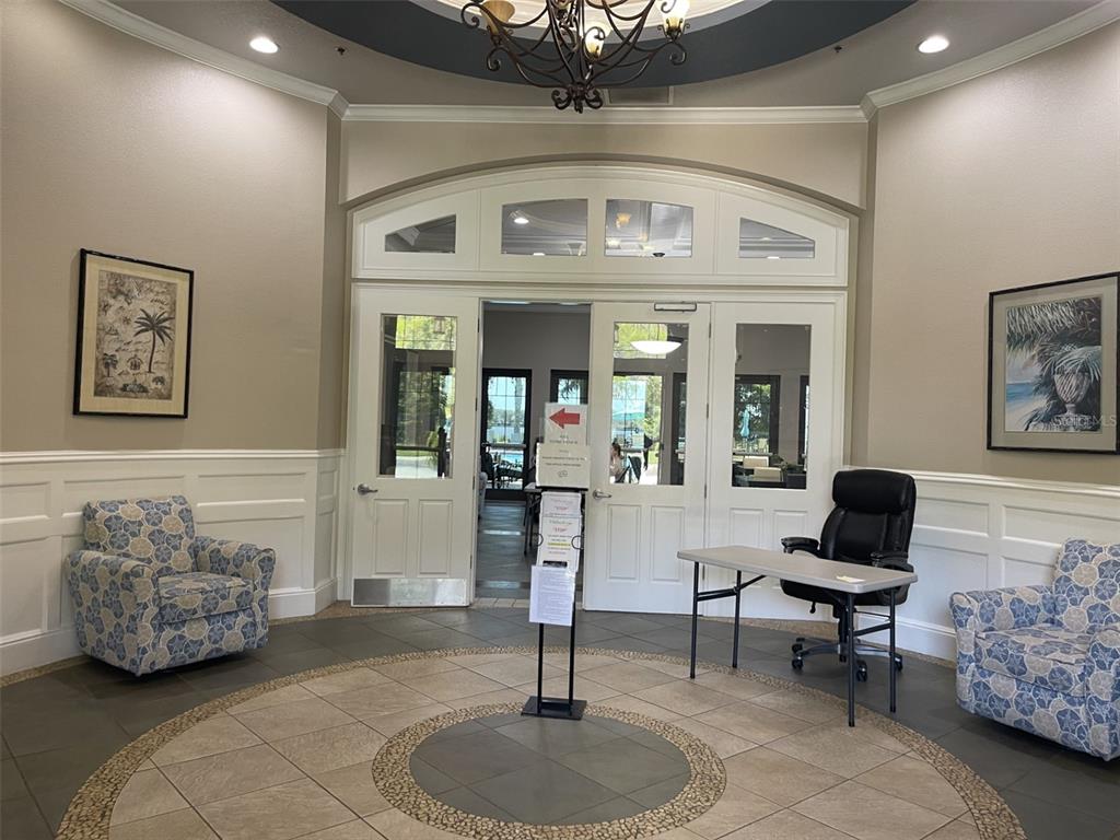 11901 Castine Street New Port Richey, FL 34654 - Photo 17 of 27 a living room with furniture and a mirror