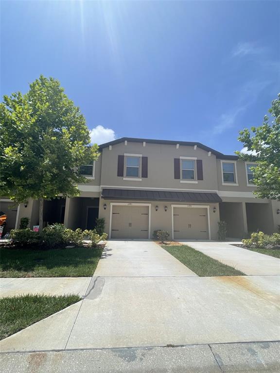 11901 Castine Street New Port Richey, FL 34654 - Photo 2 of 27 a view of house with yard