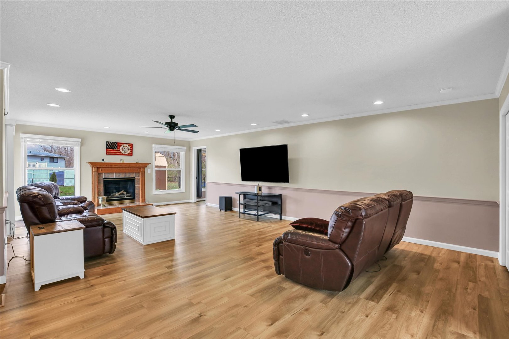 3629 Tuttle Street Danville, IL 61832 - Photo 12 of 47 a living room with fireplace furniture and a flat screen tv