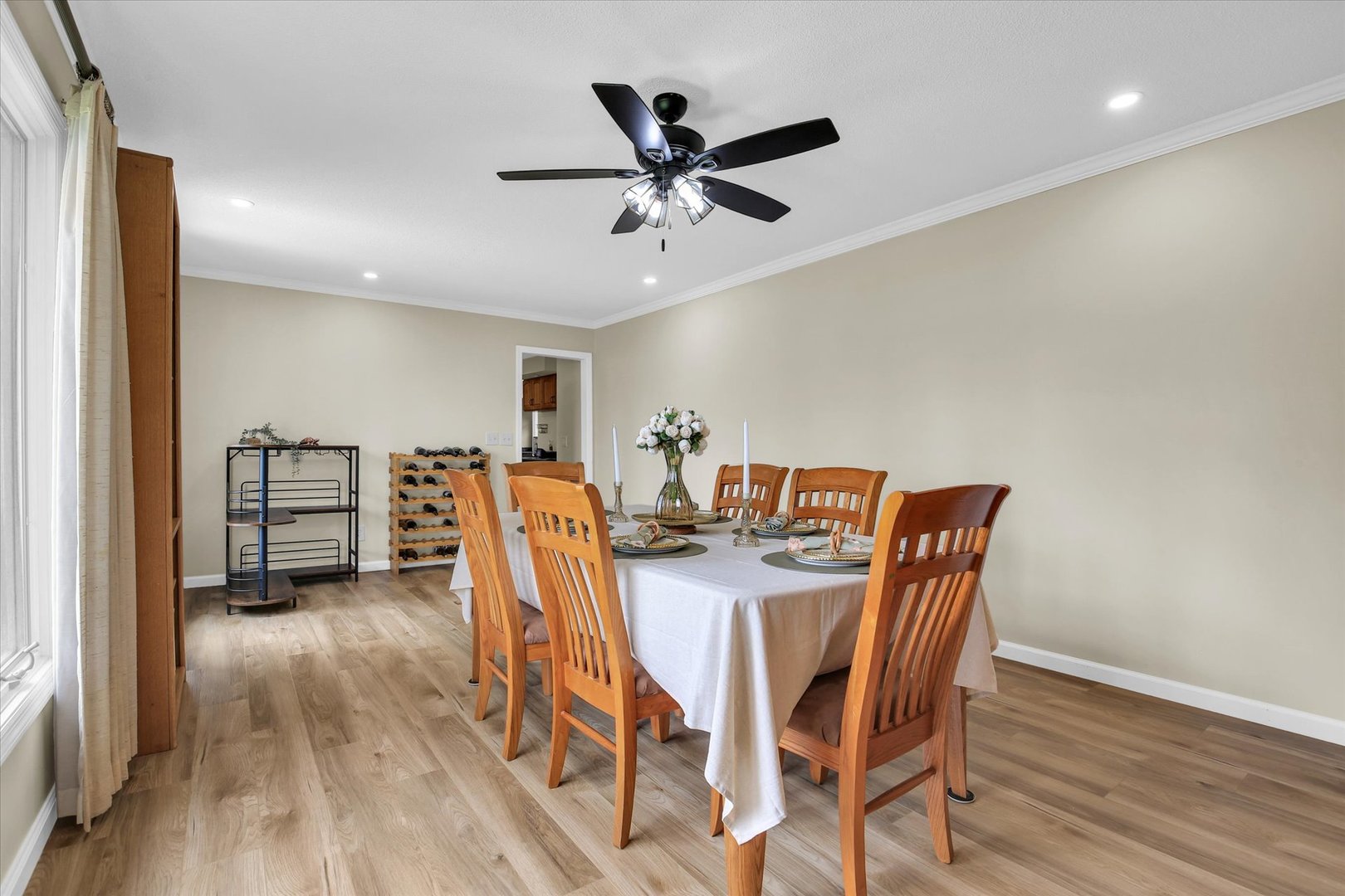 3629 Tuttle Street Danville, IL 61832 - Photo 16 of 47 a view of a dining room with furniture and wooden floor