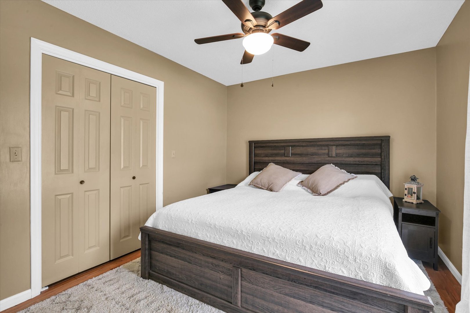 3629 Tuttle Street Danville, IL 61832 - Photo 27 of 47 a bedroom with a bed and a chandelier