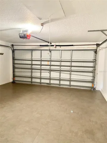 a view of a room with toys and stairs
