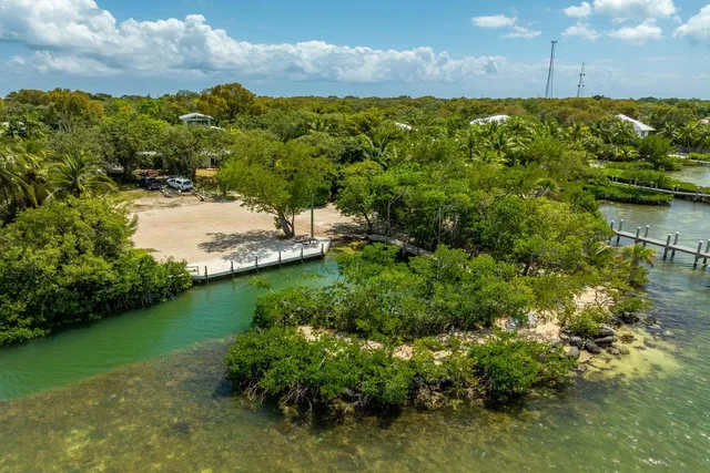 a view of a lake with a yard