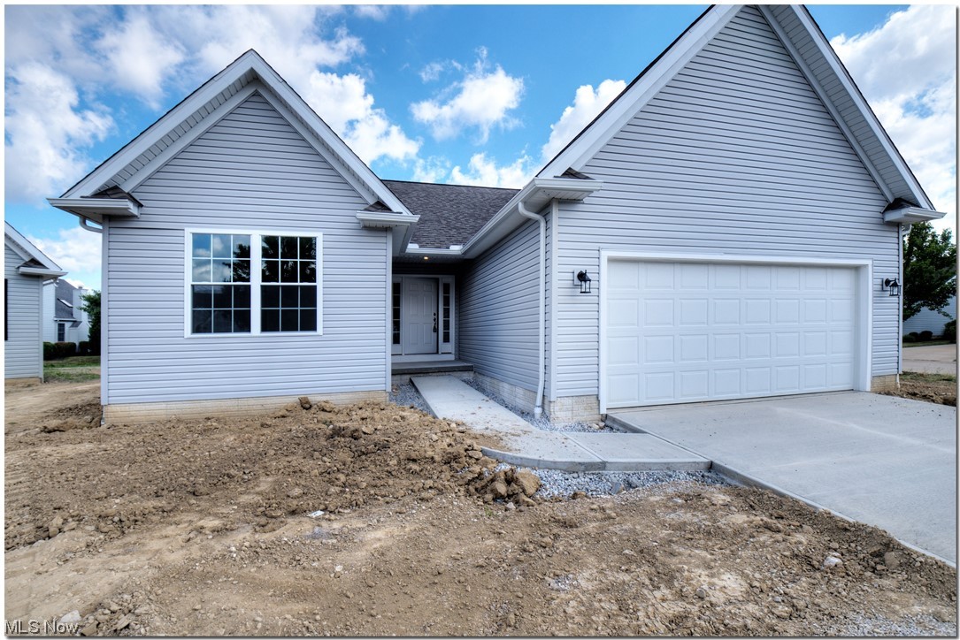 7701 Webster Road Middleburg Heights, OH 44130 - Photo 5 of 29 View of front of home featuring a garage