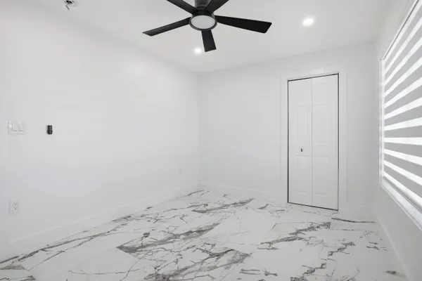 a view of a room with a window