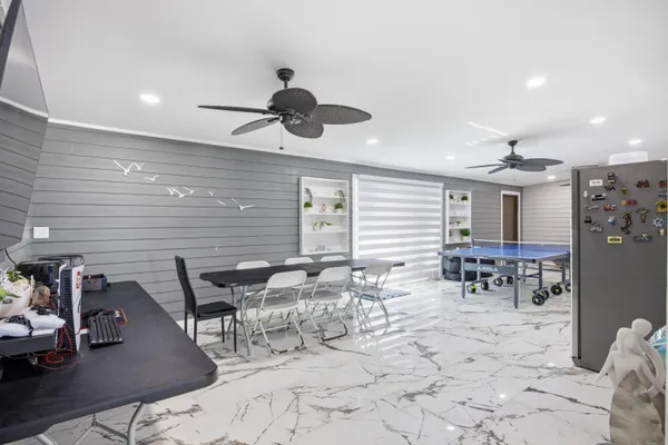 a view of a dining room with furniture