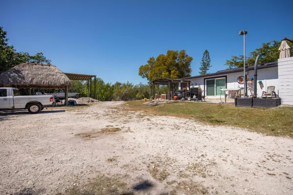 a view of a street with a building in the background