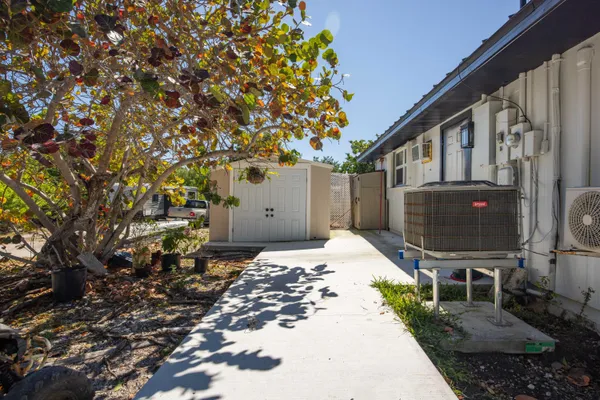 a house view with a backyard space