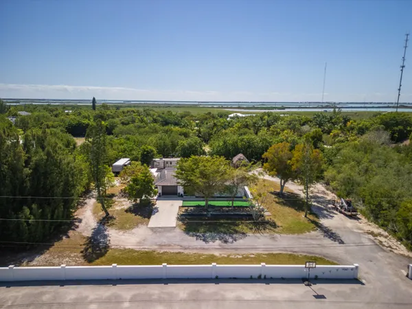 a view of a yard with an outdoor seating