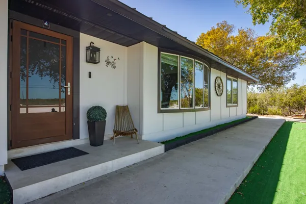 a view of a house with a garden