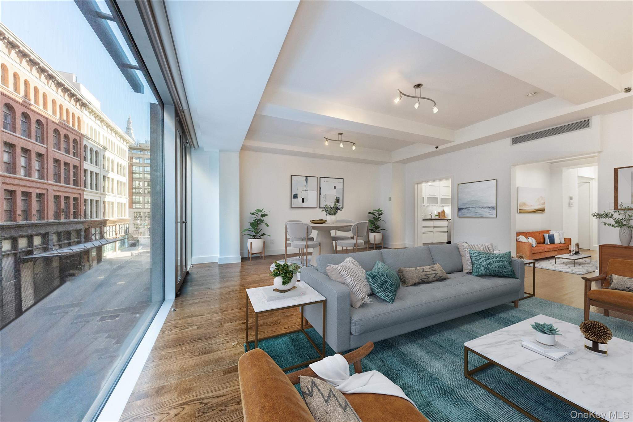 116 West 22nd Street, Unit 3 Manhattan, NY 10011 - Photo 12 of 27 a living room with furniture and a table