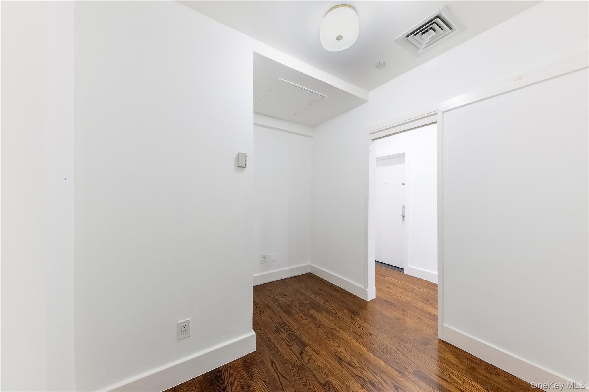 116 West 22nd Street, Unit 3 Manhattan, NY 10011 - Photo 20 of 27 a view of small space with wooden floor