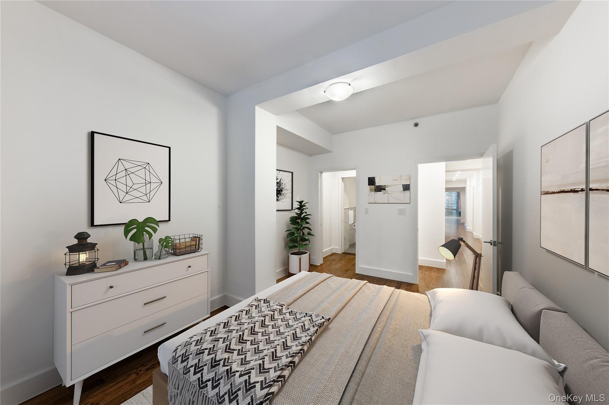 116 West 22nd Street, Unit 3 Manhattan, NY 10011 - Photo 10 of 27 a bedroom with a bed and a cabinets