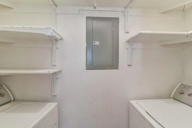 a utility room with a washer and dryer