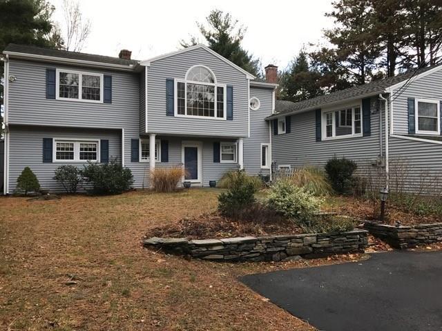 19 High Farms Road West Hartford, CT 06107 - Photo 1 of 1 a front view of a house with a yard