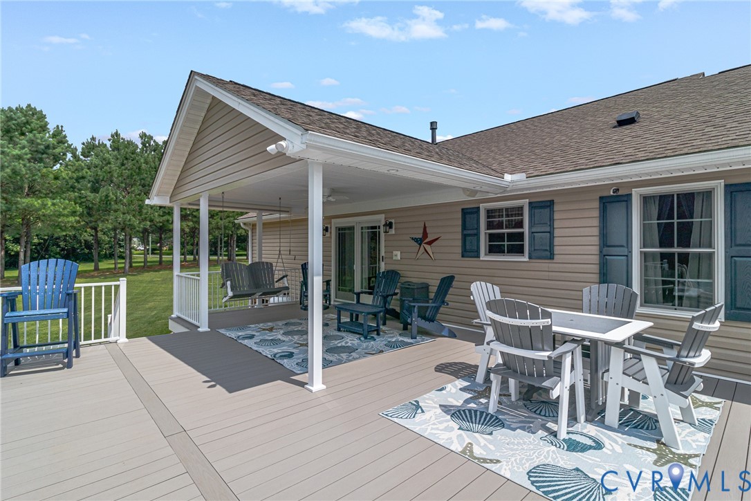 184 Crosshills Road Heathsville, VA 22473 - Photo 4 of 44 Expansive wood-finish deck with a covered porch