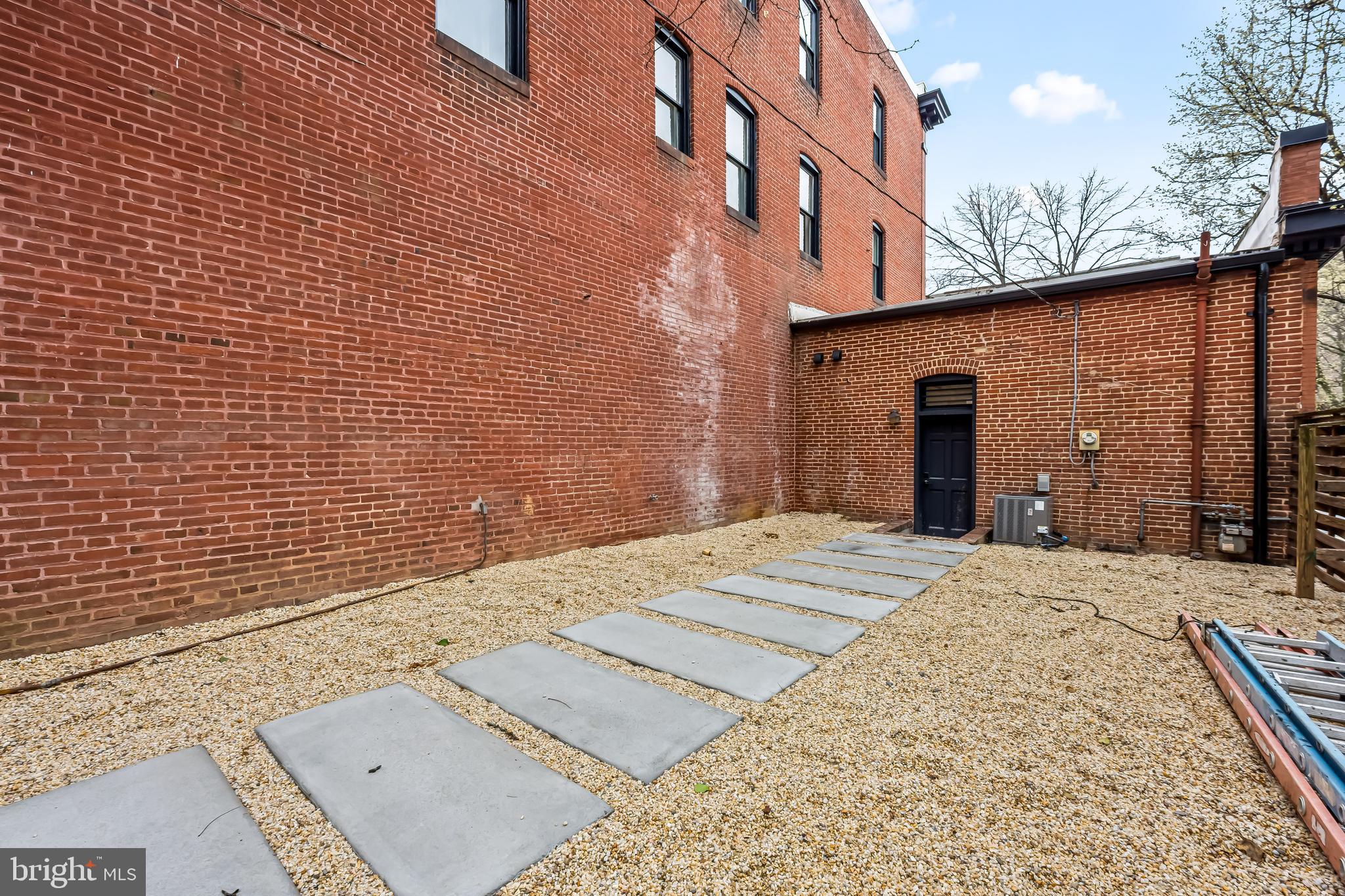 1202 Bolton Street, Unit 2 Baltimore, MD 21217 - Photo 24 of 25 a backyard of a house