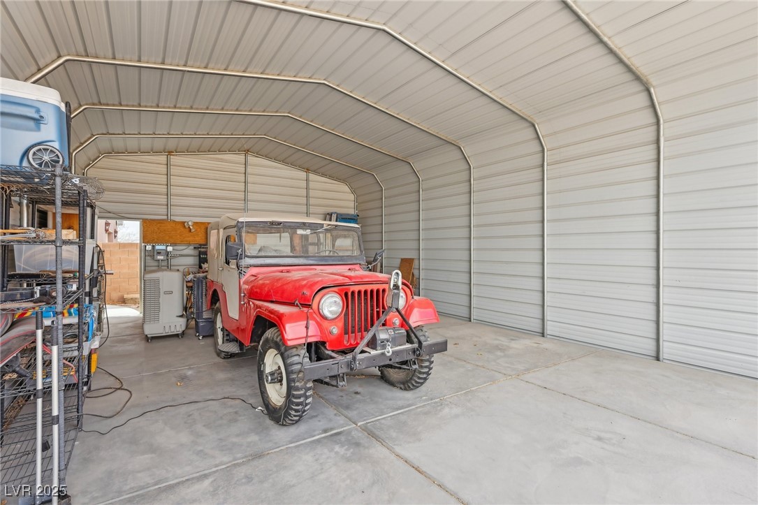 519 North Racetrack Road Henderson, NV 89015 - Photo 72 of 98 Garage featuring a detached carport