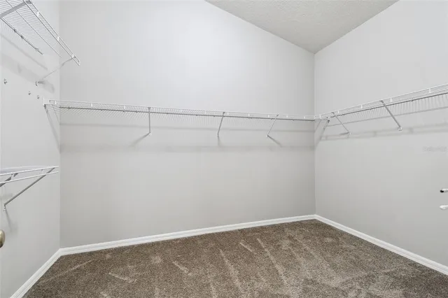 a view of a room with racks on the wall