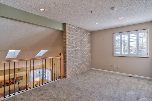 a view of hallway with stairs