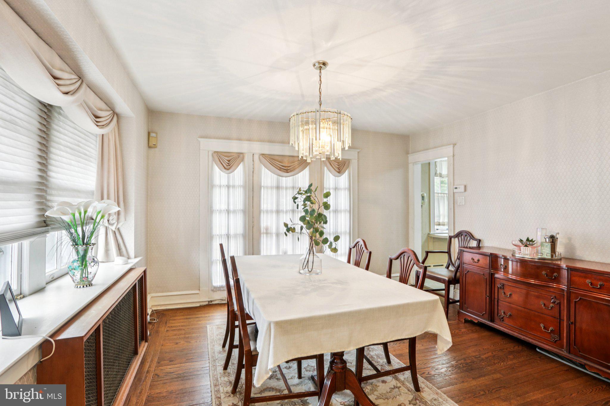 708 Meetinghouse Road Elkins Park, PA 19027 - Photo 13 of 38 a view of a dining room with furniture window and wooden floor