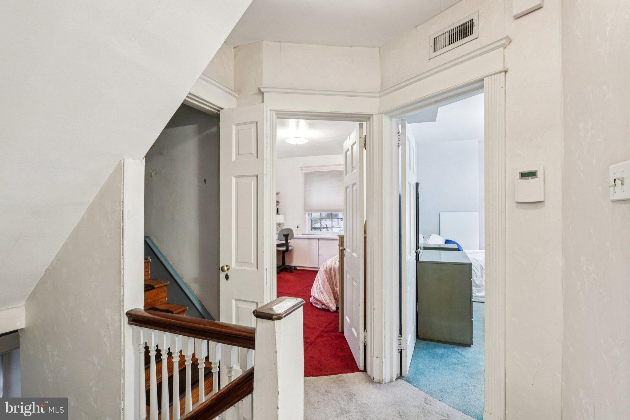 708 Meetinghouse Road Elkins Park, PA 19027 - Photo 20 of 38 a view of a hallway with a livingroom and a fireplace
