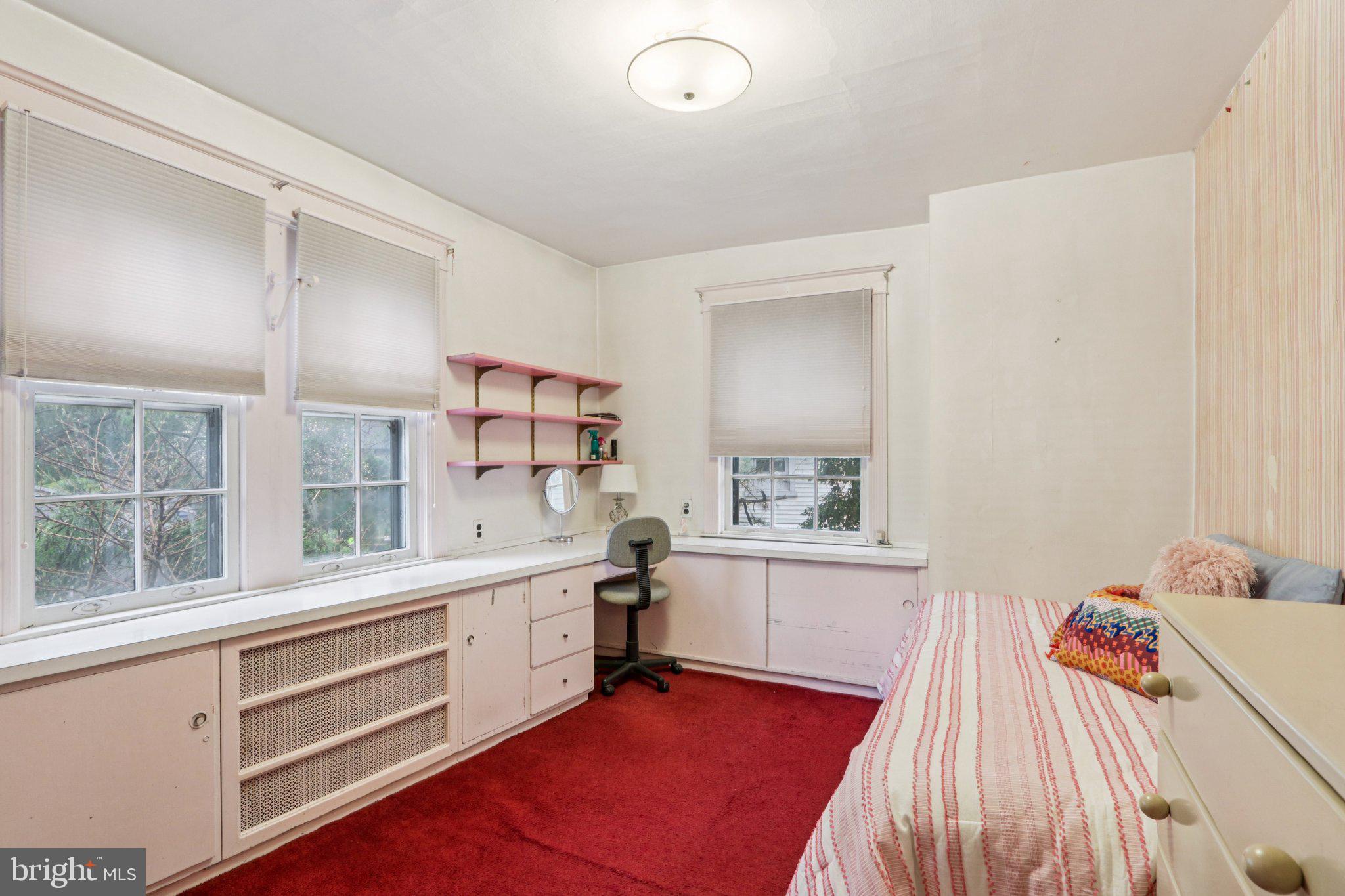 708 Meetinghouse Road Elkins Park, PA 19027 - Photo 21 of 38 a room with a bed and a window