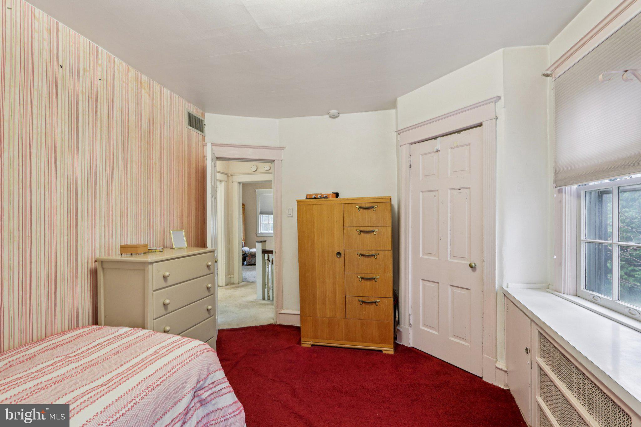 708 Meetinghouse Road Elkins Park, PA 19027 - Photo 22 of 38 a bedroom with a bed and a dresser