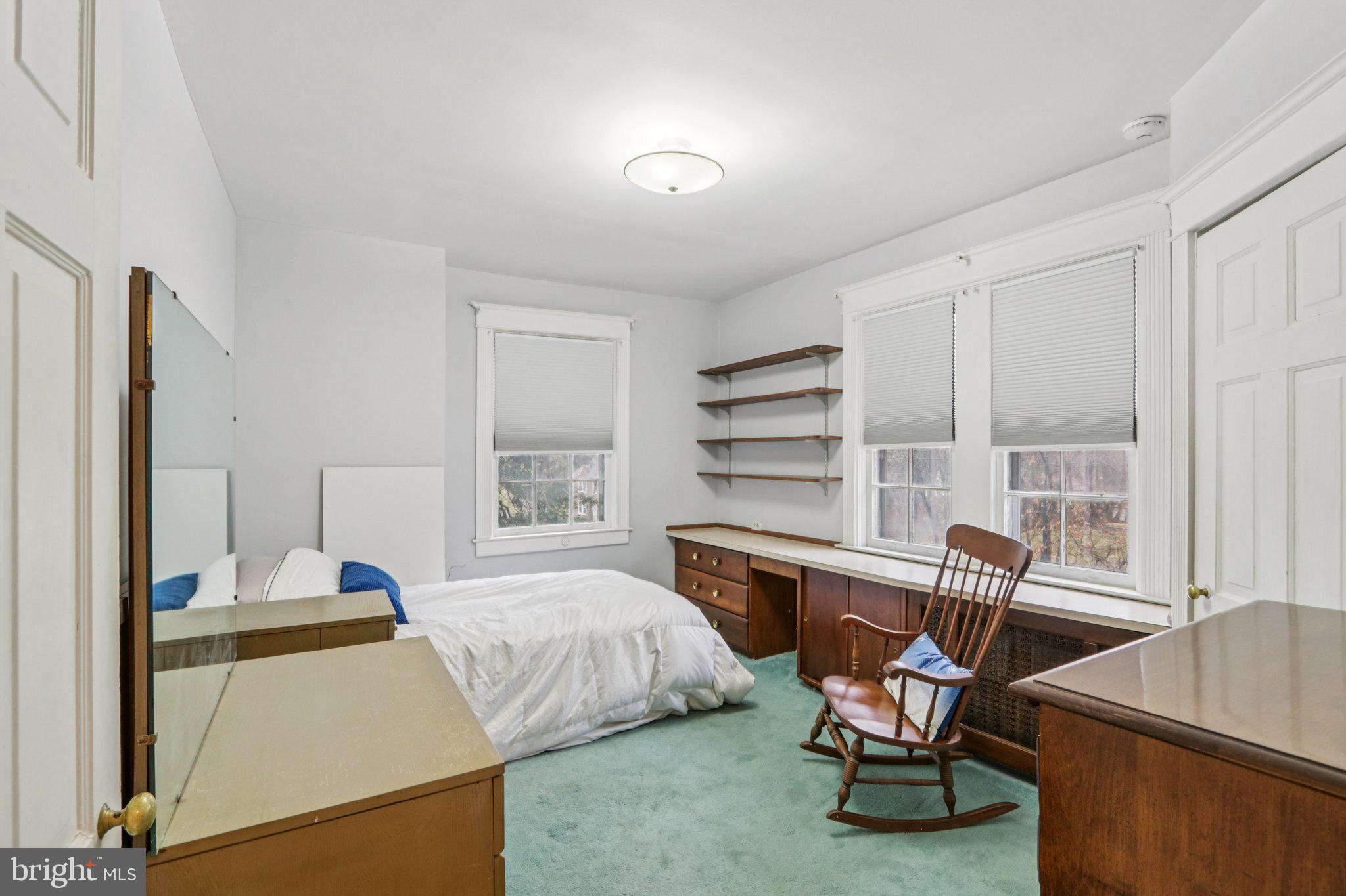 708 Meetinghouse Road Elkins Park, PA 19027 - Photo 23 of 38 a bedroom with a bed a desk and chair