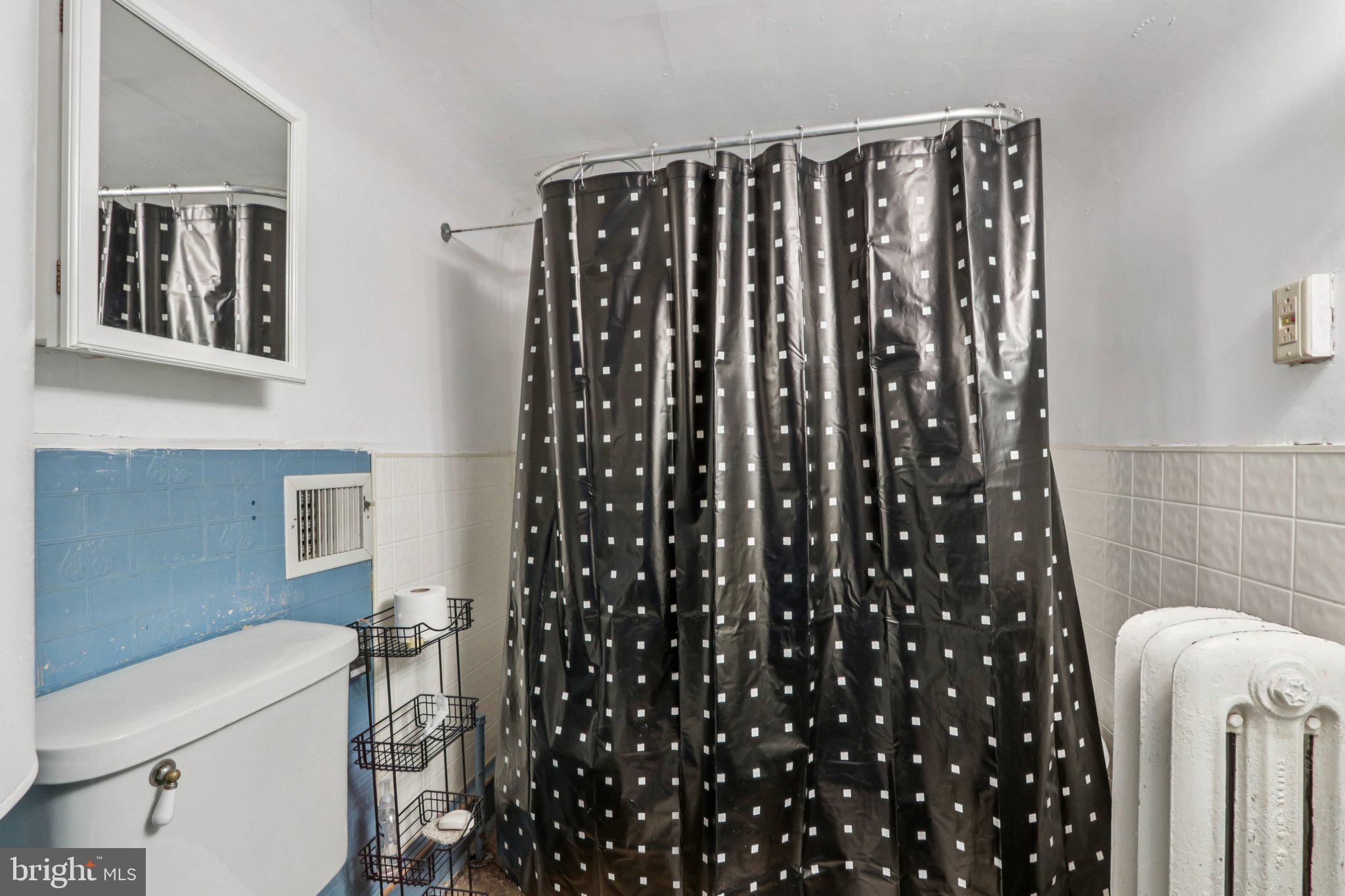 708 Meetinghouse Road Elkins Park, PA 19027 - Photo 29 of 38 a bathroom with a toilet and shower