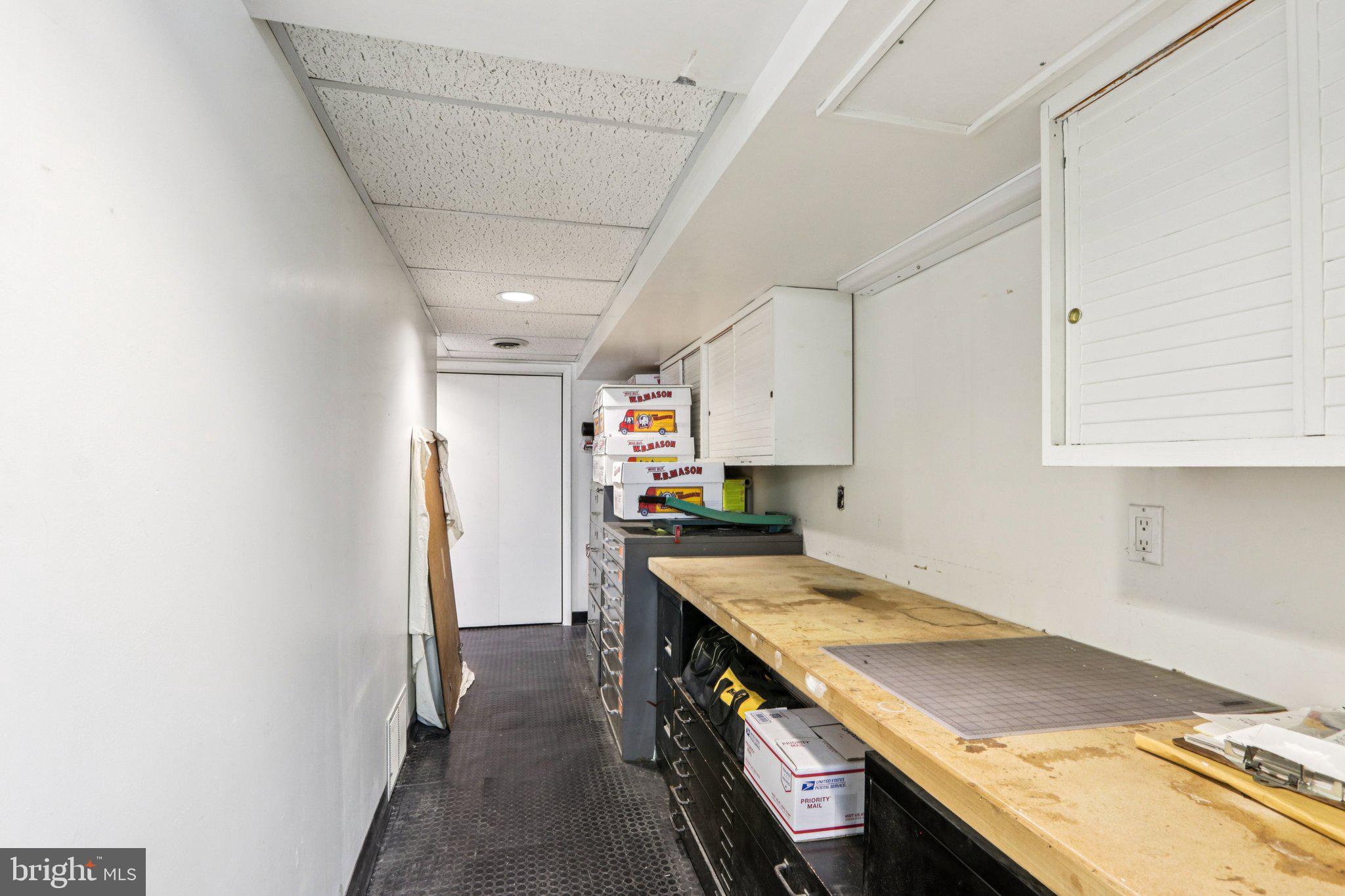 708 Meetinghouse Road Elkins Park, PA 19027 - Photo 33 of 38 a kitchen with a sink stove and cabinets