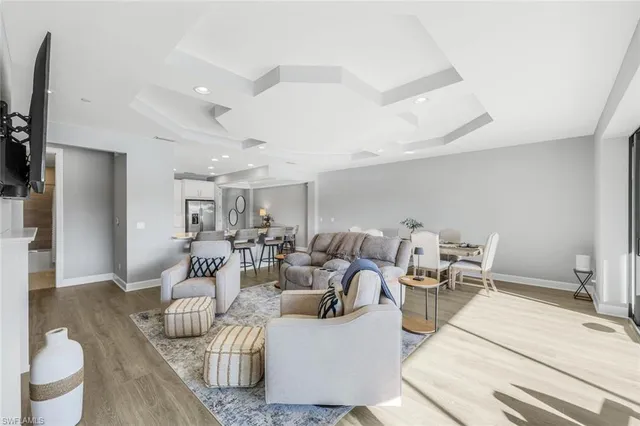 a living room with furniture and a table