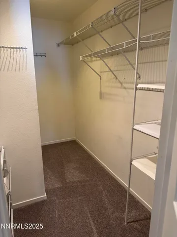 a view of a room with racks on the wall