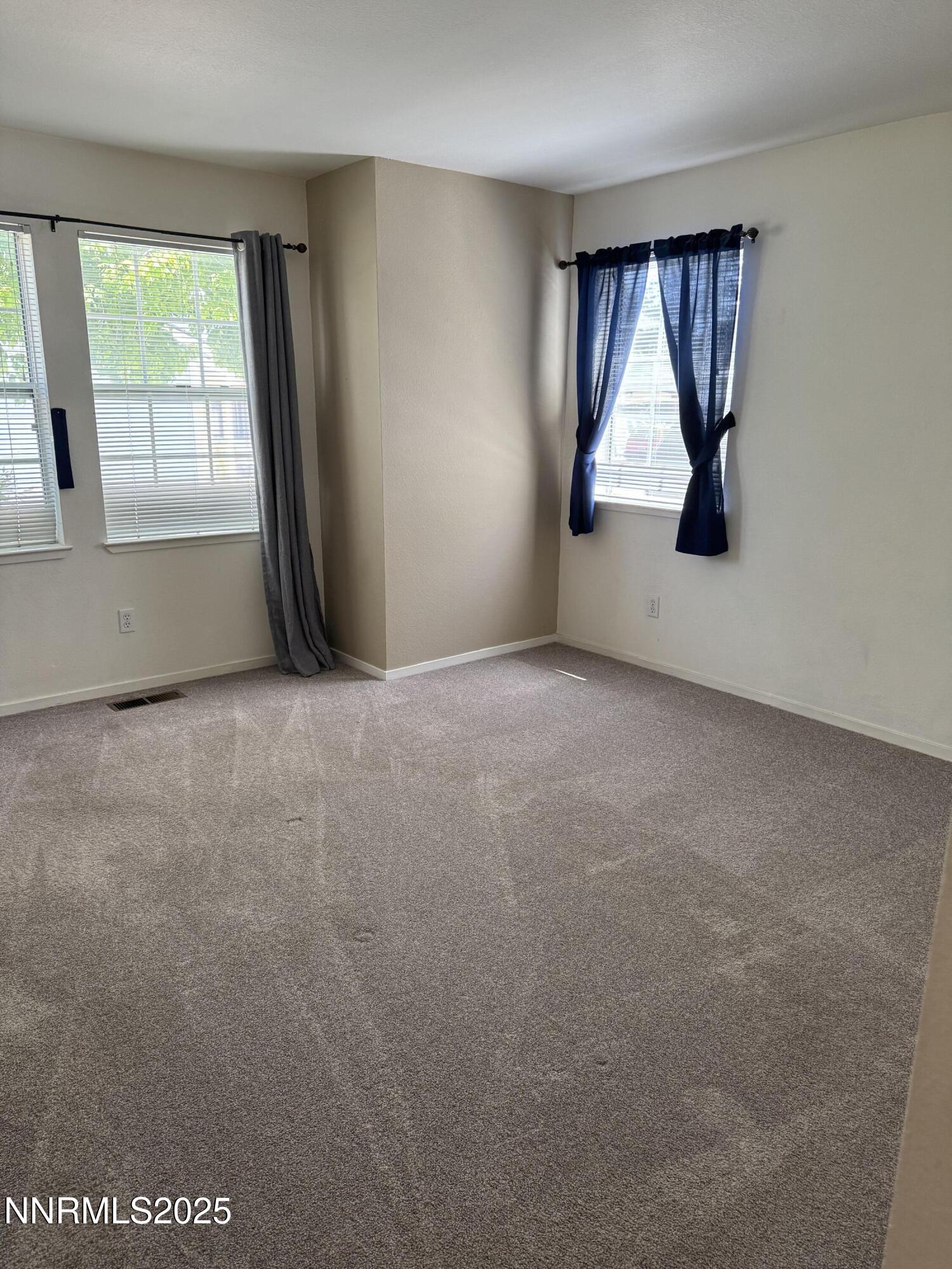 3016 Hauser Court Carson City, NV 89701 - Photo 5 of 13 an empty room with windows