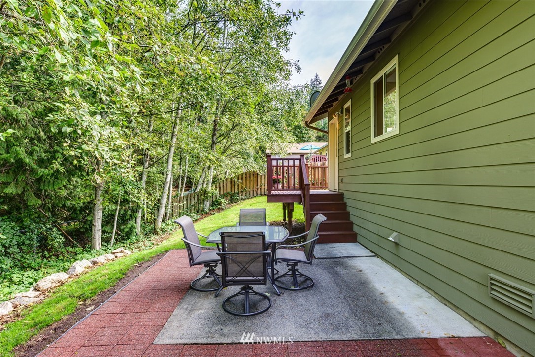1508 Roma Road Bellingham, WA 98226 - Photo 22 of 25 a view of a backyard with sitting area