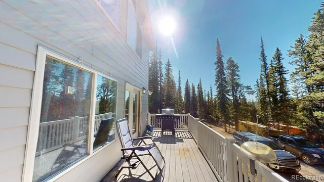 a balcony with chairs