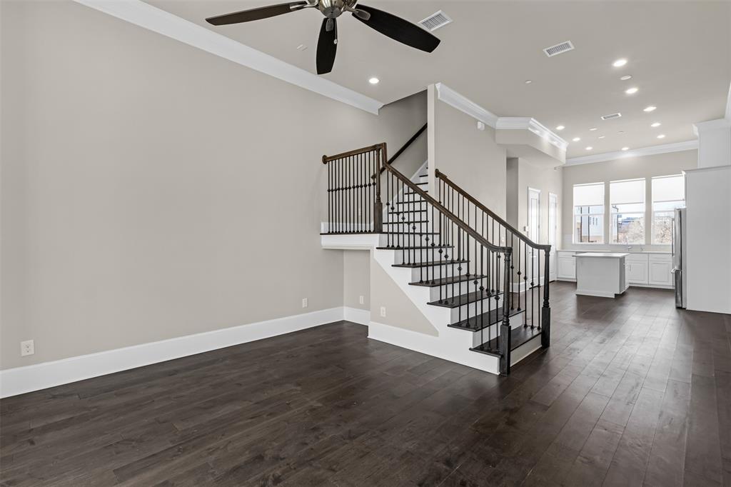 2238 Alterbrook Lane Dallas, TX 75219 - Photo 9 of 19 wooden floor in an empty room with a window