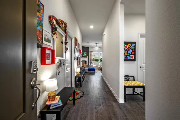 a kitchen with sink refrigerator and stove