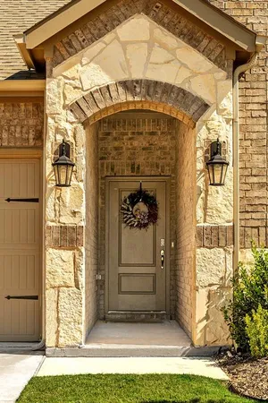 a front view of a house with a porch