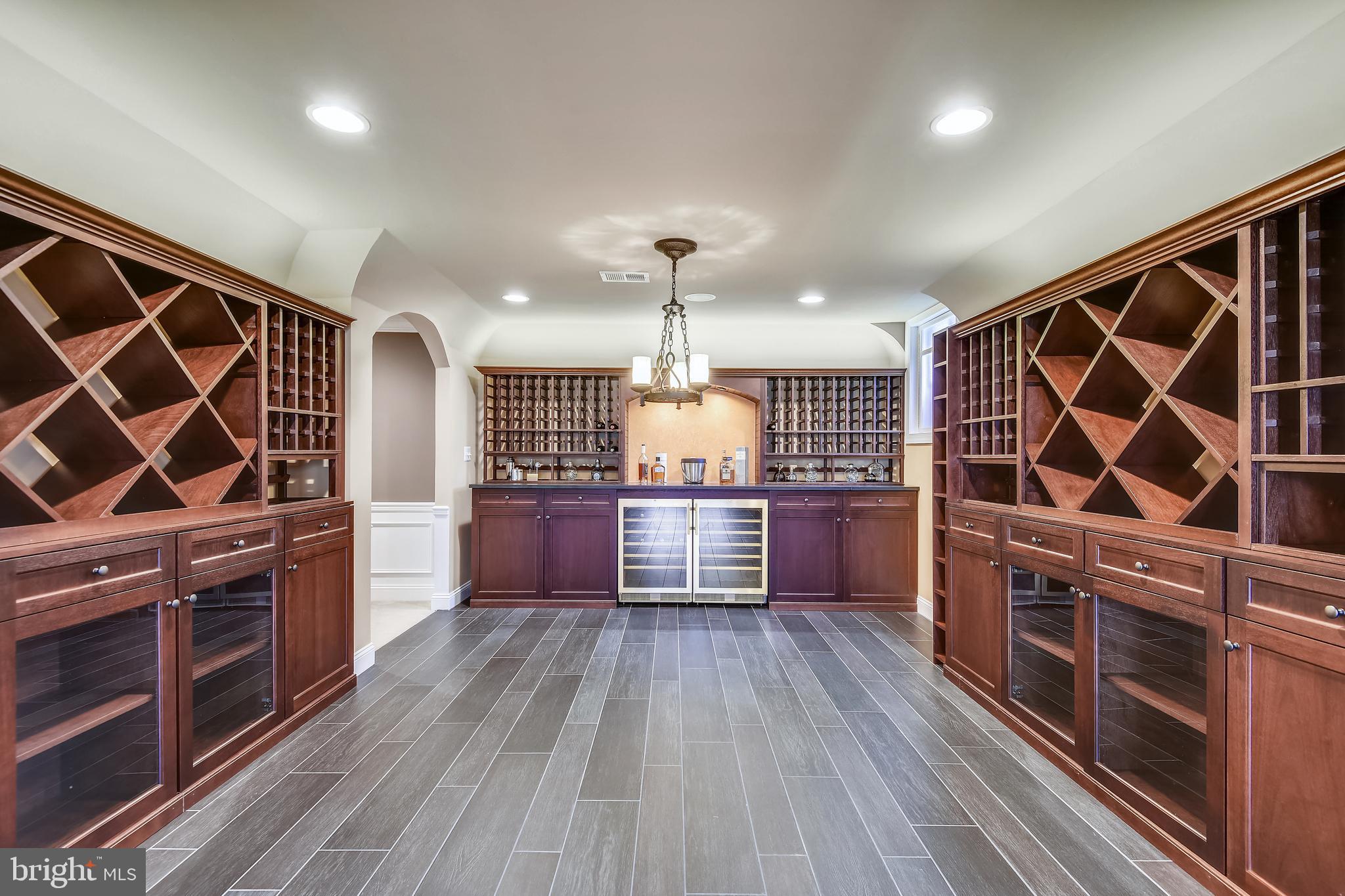 1704 Raleigh Hill Road Vienna, VA 22182 - Photo 26 of 42 Wine Tasting Room with mahogany built-ins