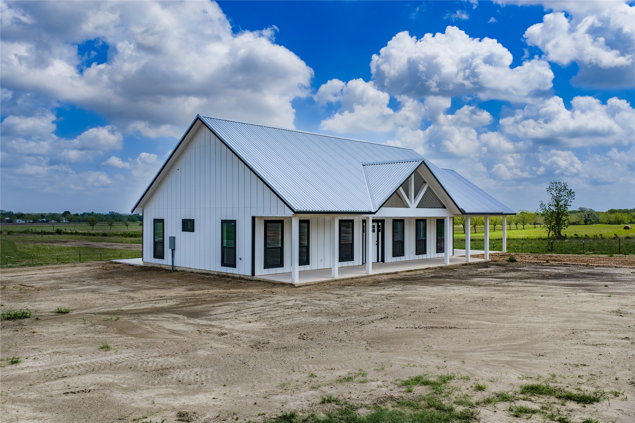 9391 Hajovsky Road La Grange, TX 78945 - Photo 14 of 22 a front view of a house with a yard